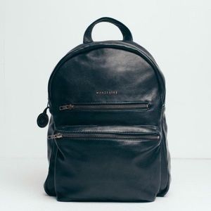 Black leather unisex backpack
